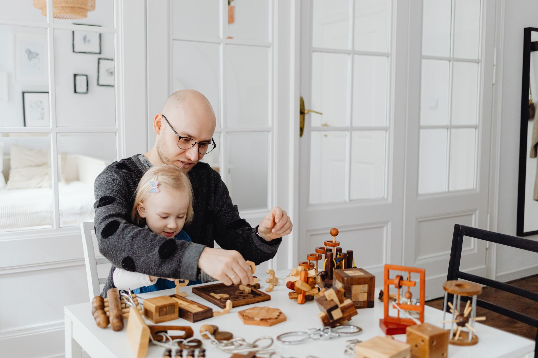 Child playing in a therapist's office with toys