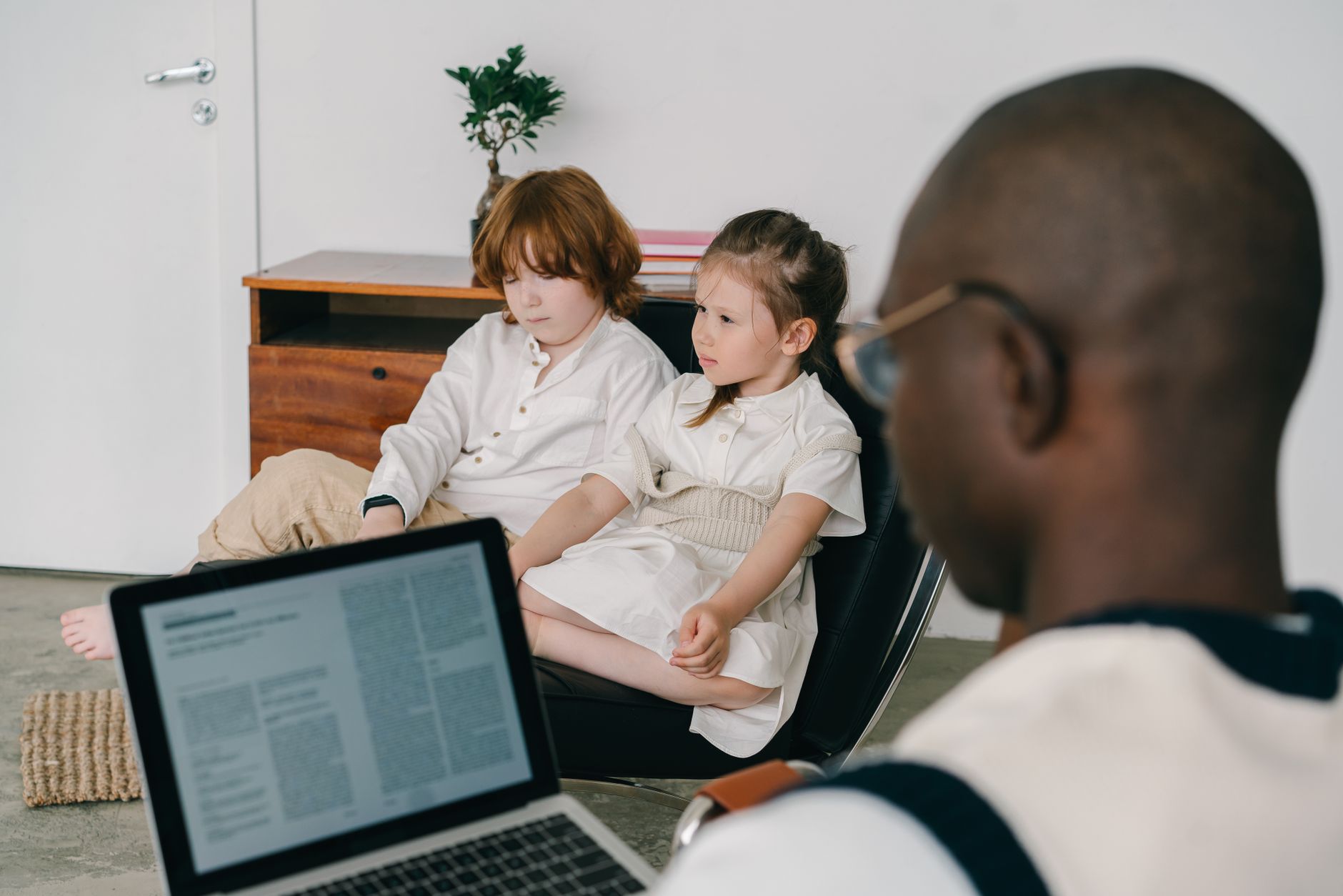 Child talking gently with a counselor