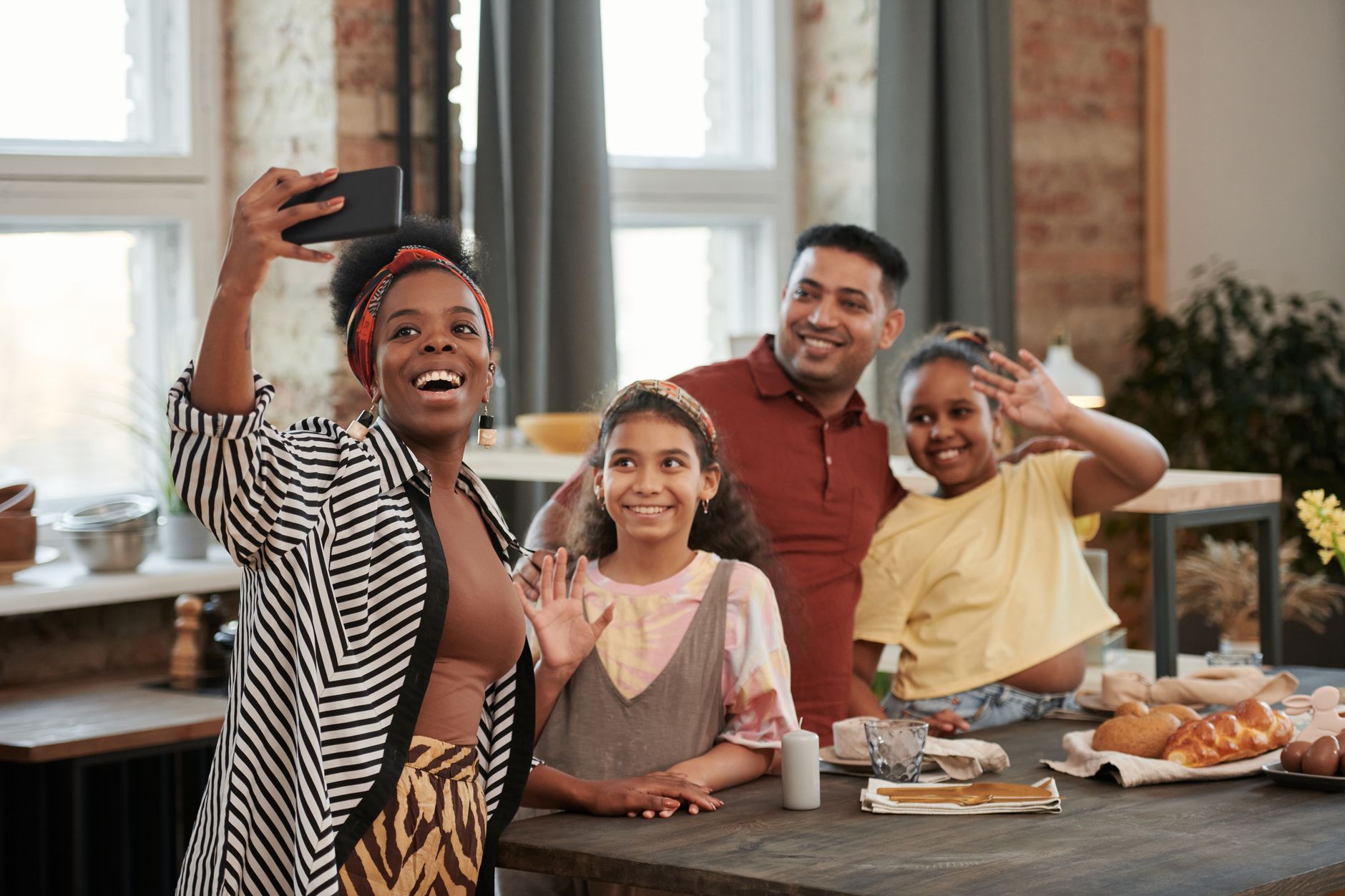 Multicultural family together at home