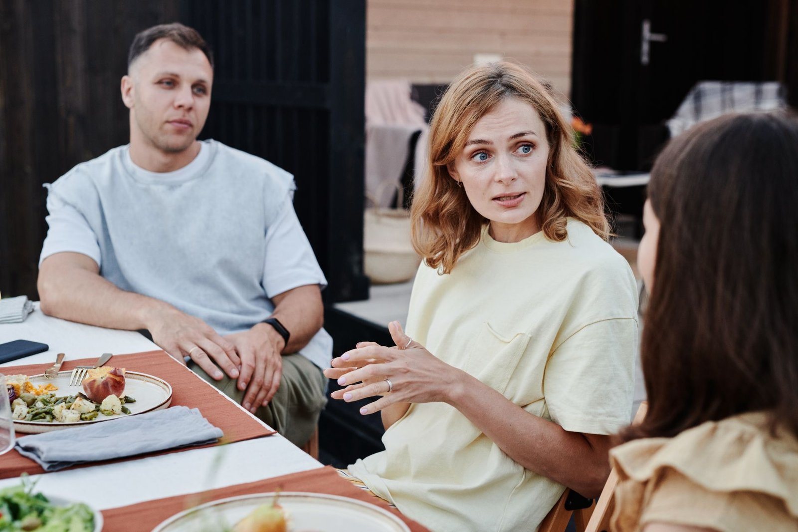 Family sitting together talking calmly