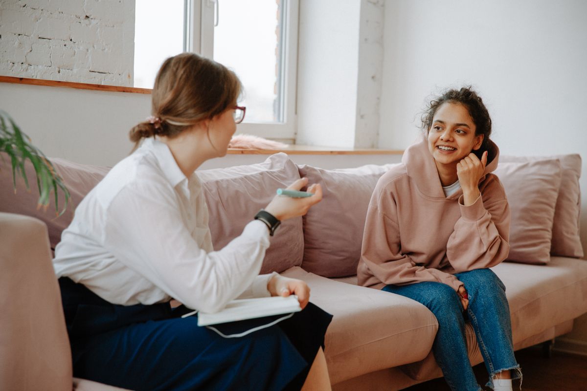 Client smiling during a supportive individual therapy session in Brampton