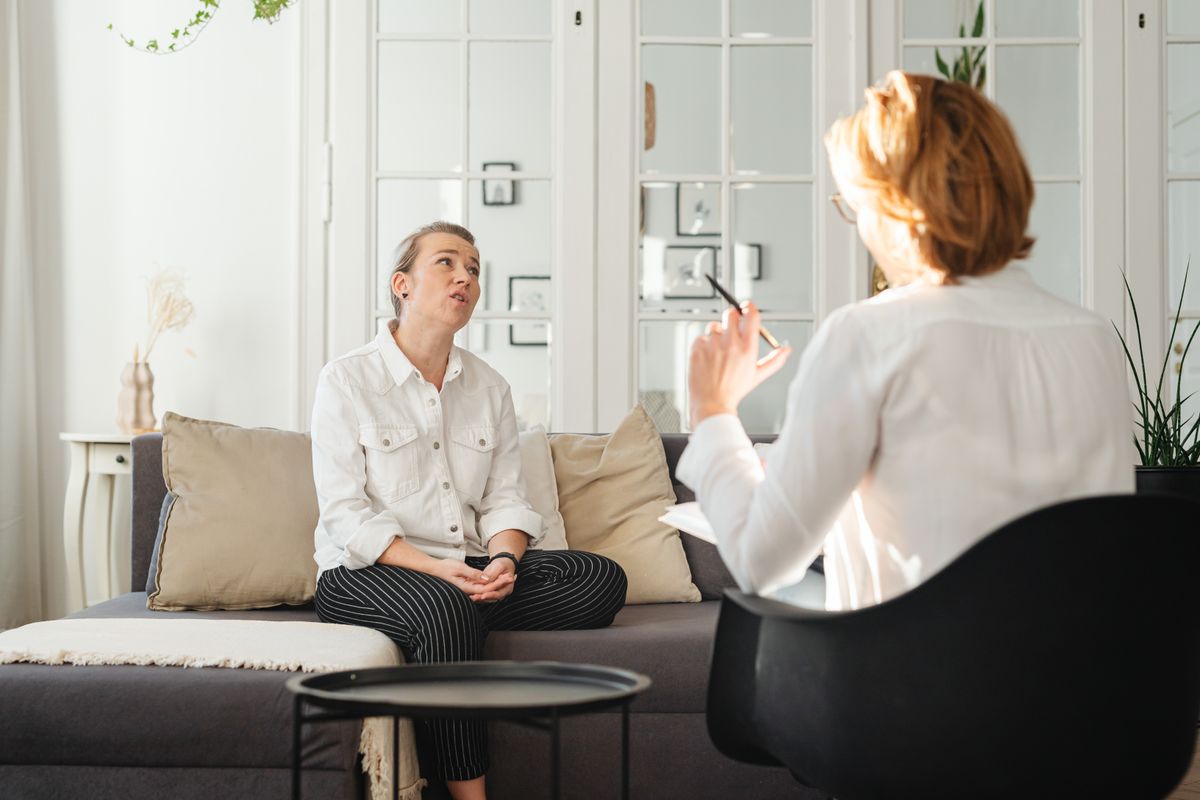 Warm conversation during a counselling session in Milton