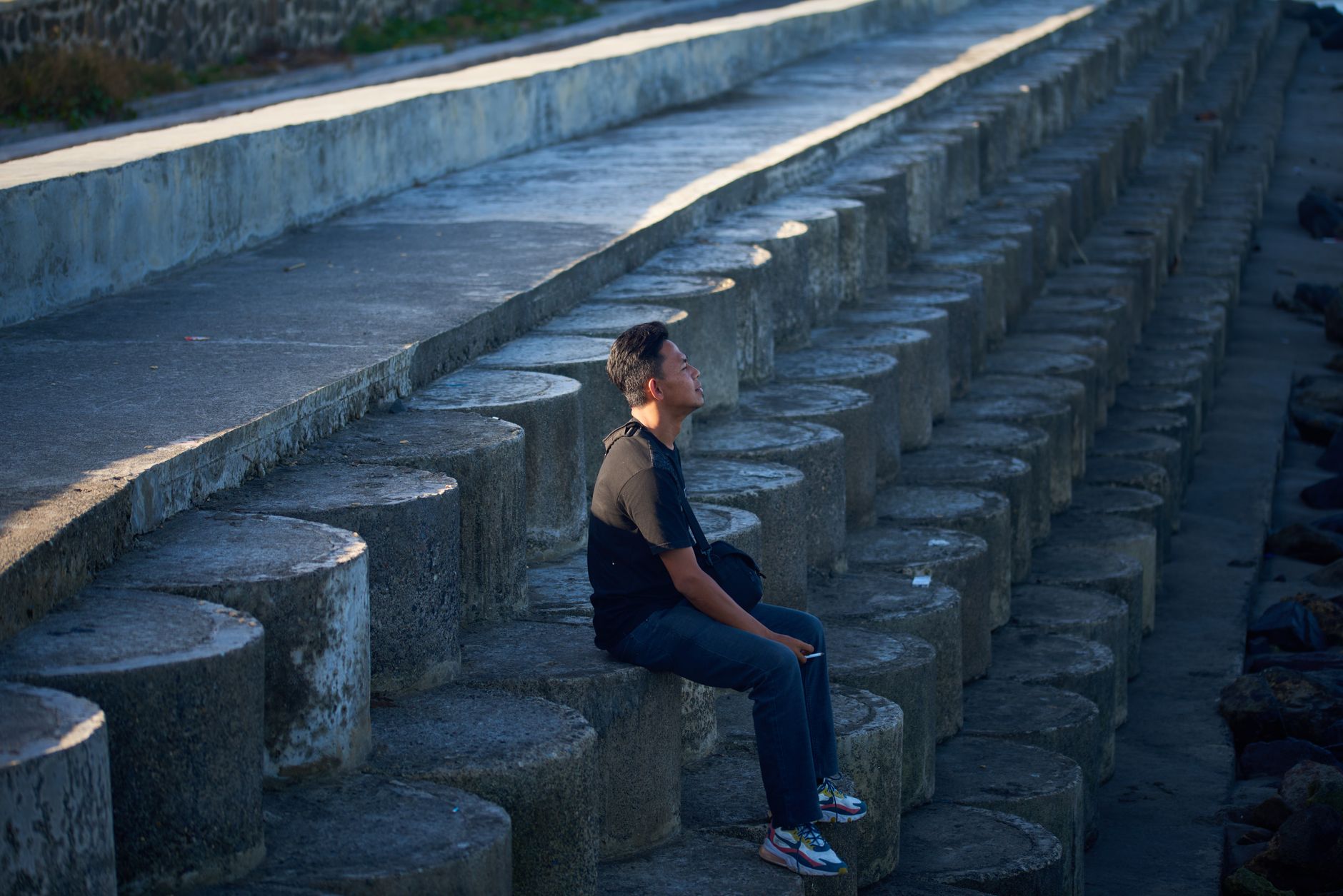 Person reflecting alone in deep thought