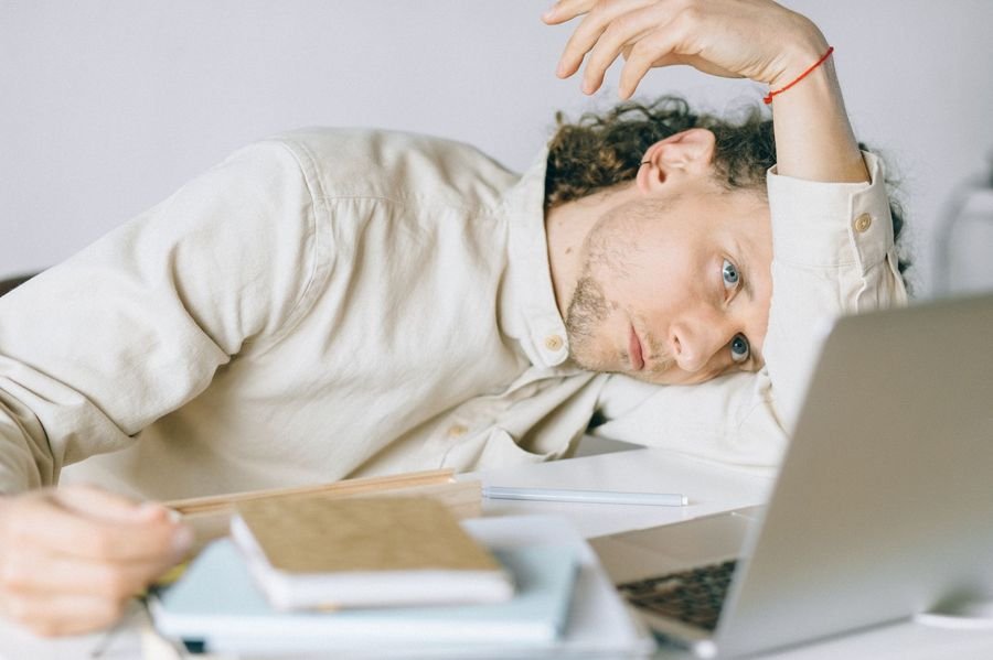 Exhausted person with tired eyes