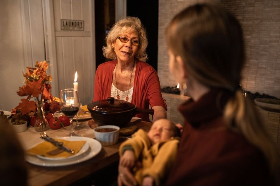 Family having a supportive dinner conversation
